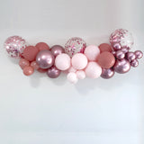 pink rosewood balloon arch with clear and pink confetti balloons